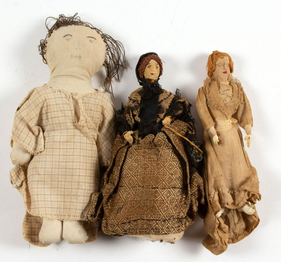 AMERICAN CLOTH DOLLS / RAG DOLLS, LOT OF THREE: AMERICAN CLOTH DOLLS / RAG DOLLS, LOT OF THREE, comprising two fashion lady examples, remaining a child doll, each with hand-stitched features, various shades of brown hair. Each with original clothin