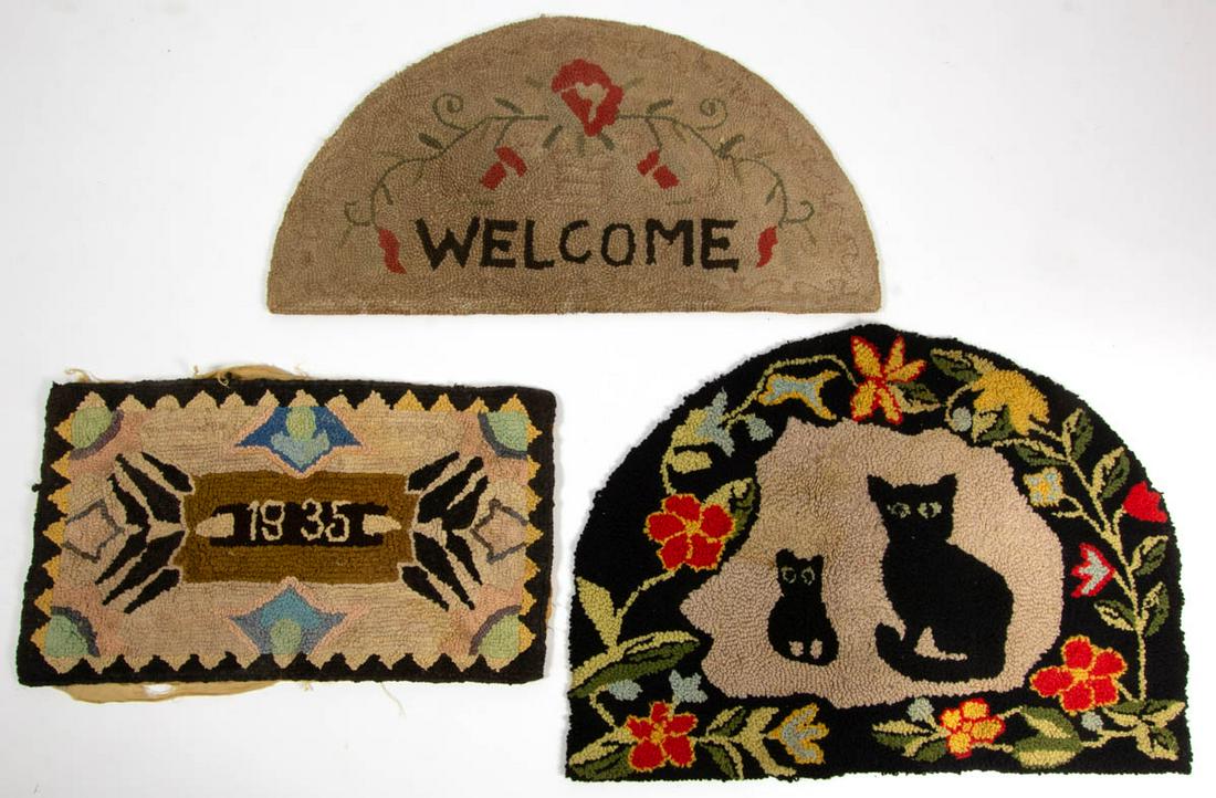 AMERICAN FOLK ART FIGURAL / FLORAL HOOKED RUGS, LOT OF: AMERICAN FOLK ART FIGURAL / FLORAL HOOKED RUGS, LOT OF THREE, mixed fabrics on burlap, including one depicting two black cats. One dated 1935. Black Cats 24 1/2" x 34". Good to very good overall condi