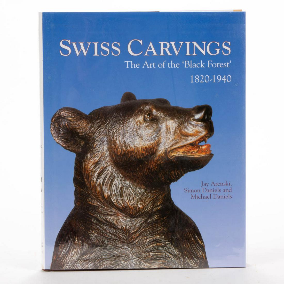 SWISS CARVINGS FOLK ART BOOK: SWISS CARVINGS FOLK ART BOOK, Jay Arenski, Simon Daniels, and Michael Daniels, "Swiss Carvings: The Art of the 'Black Forest', 1820-1940", Antique Collectors' Club, 2005. Hardcover with dust jacket. S