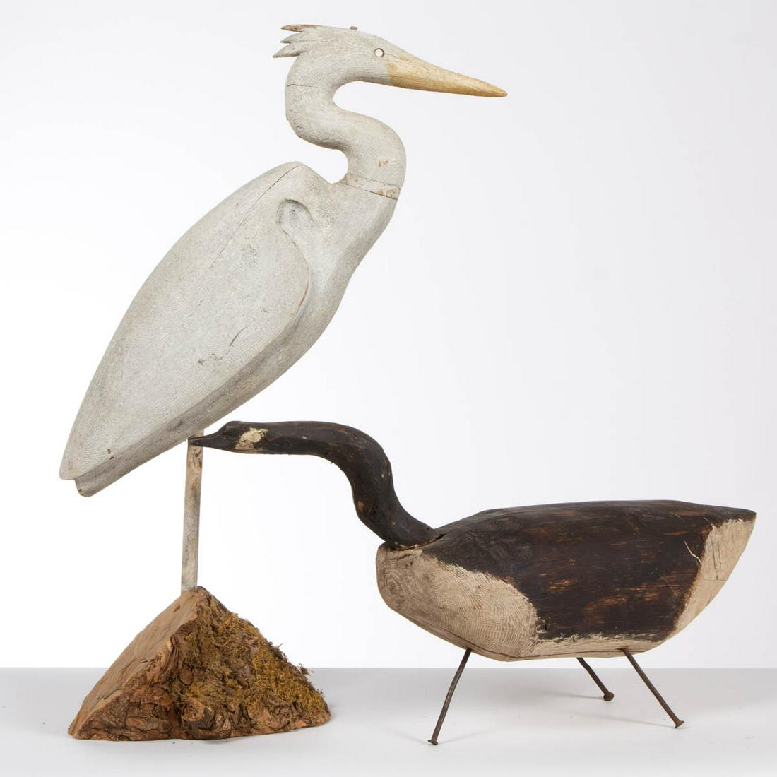 FOLK ART CARVED AND PAINTED DECOYS, LOT OF TWO: FOLK ART CARVED AND PAINTED DECOYS, LOT OF TWO, comprising a heron confidence decoy affixed to a stump, and a rootneck Canada goose example. Each retaining likely original painted surface. 20th centur