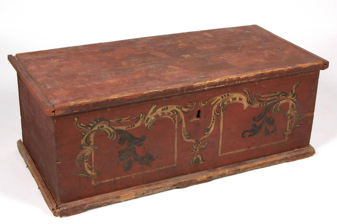 COUNTRY PAINT-DECORATED PINE BLANKET CHEST: COUNTRY PAINT-DECORATED PINE BLANKET CHEST, hinged lid over a dovetailed case, applied base molding. Retains original wrought-iron hinges and dry, polychrome surface. Fourth quarter 18th/early 19th ce