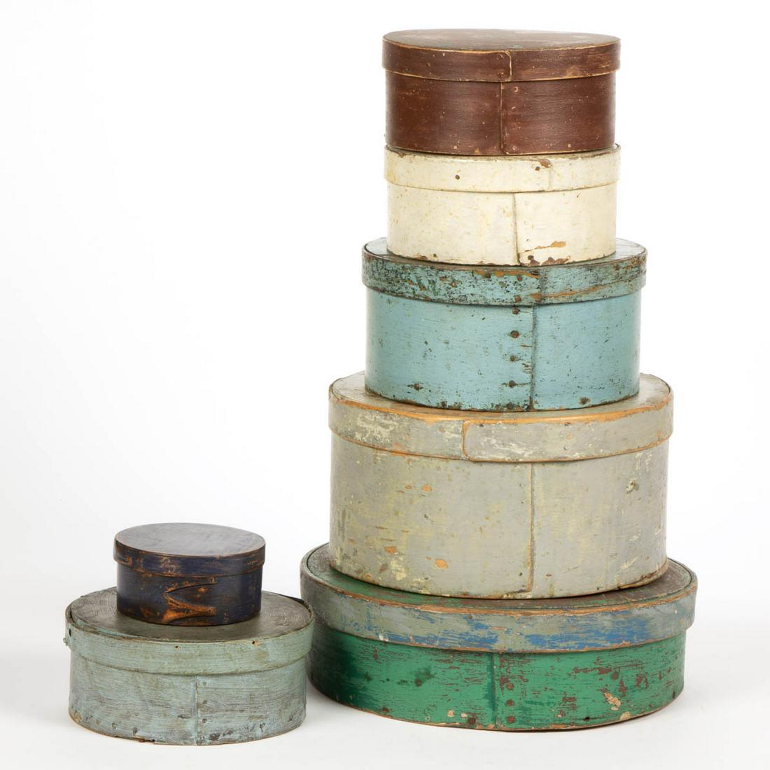 AMERICAN PAINTED BENTWOOD PANTRY BOXES, LOT OF SEVEN: AMERICAN PAINTED BENTWOOD PANTRY BOXES, LOT OF SEVEN, circular forms, lidded examples. Each with old painted surfaces. 19th century. 2" to 5 1/4" H. Good to very good overall condition, with areas of 