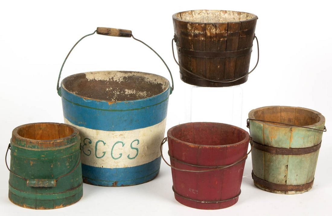 AMERICAN PAINTED TREEN BUCKETS / FIRKINS, LOT OF FIVE: AMERICAN PAINTED TREEN BUCKETS / FIRKINS, LOT OF FIVE, each with a wire bail handle, including one inscribed "Eggs" with floral decoration. Each retains an old painted surface. 19th century. 6 1/4" to