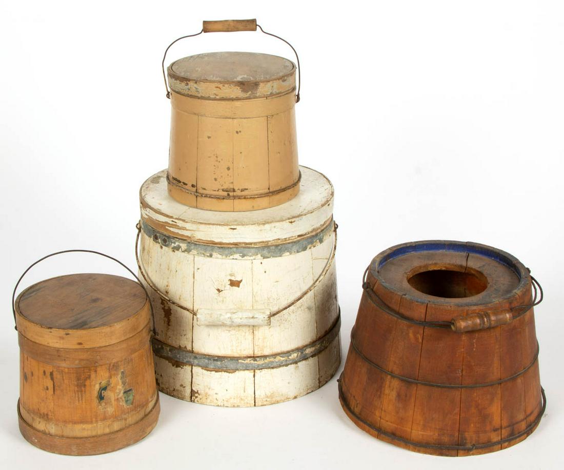 AMERICAN TREEN SUGAR BUCKETS / FIRKINS, LOT OF FOUR: AMERICAN TREEN SUGAR BUCKETS / FIRKINS, LOT OF FOUR, including three with likely original covers, each with a wire bail handle. One example retains an old white-painted surface. 19th century. 6 1/2" t