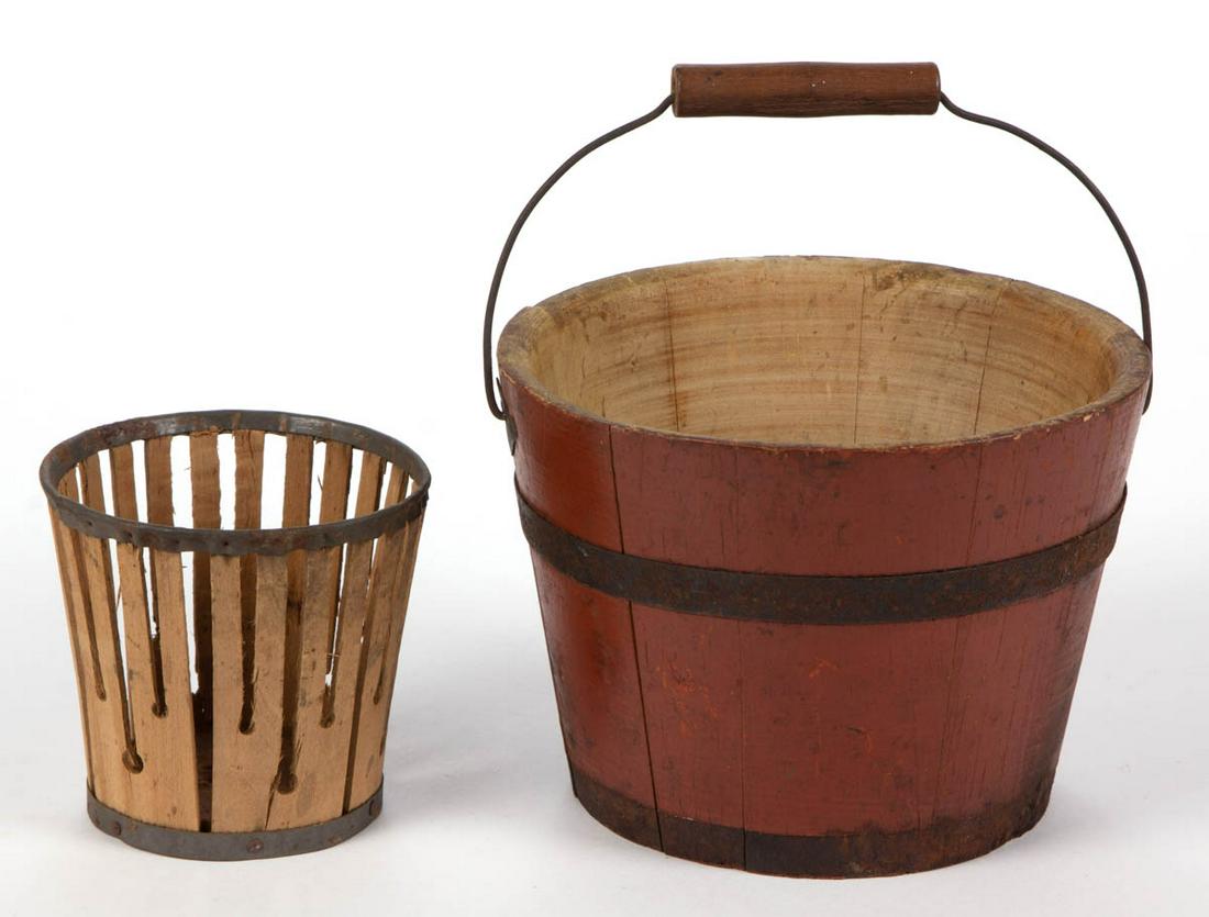 SHAKER PAINTED BERRY BUCKET: SHAKER PAINTED BERRY BUCKET, with wire bail handle. Old red-painted surface. Together with a small basket. Two pieces total. 19th century. 6 1/2" HOA, 4" H rim, 5 1/2" D rim. Berry bucket in very good