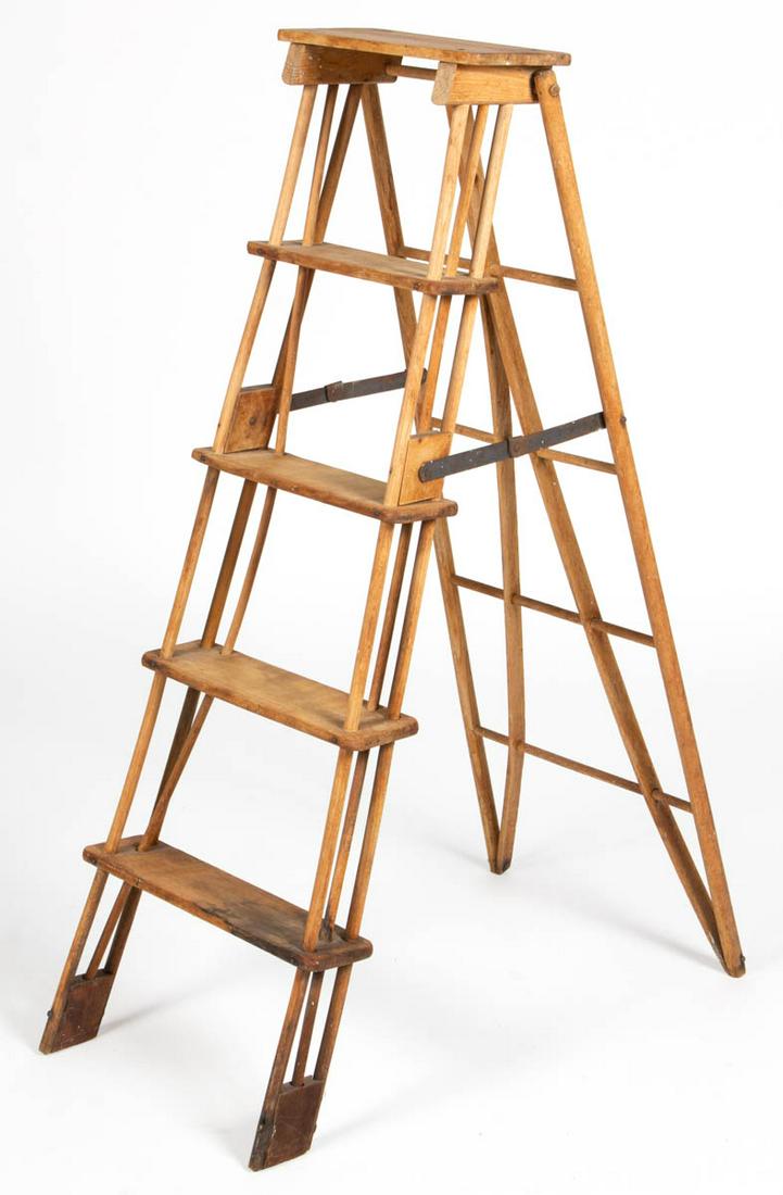 AMERICAN COUNTRY WOODEN LADDER: AMERICAN COUNTRY WOODEN LADDER, folding example, with five graduated steps. Dry natural surface. First half 20th century. 42 1/2" H. Very good overall condition, bottom step with moderate discoloratio