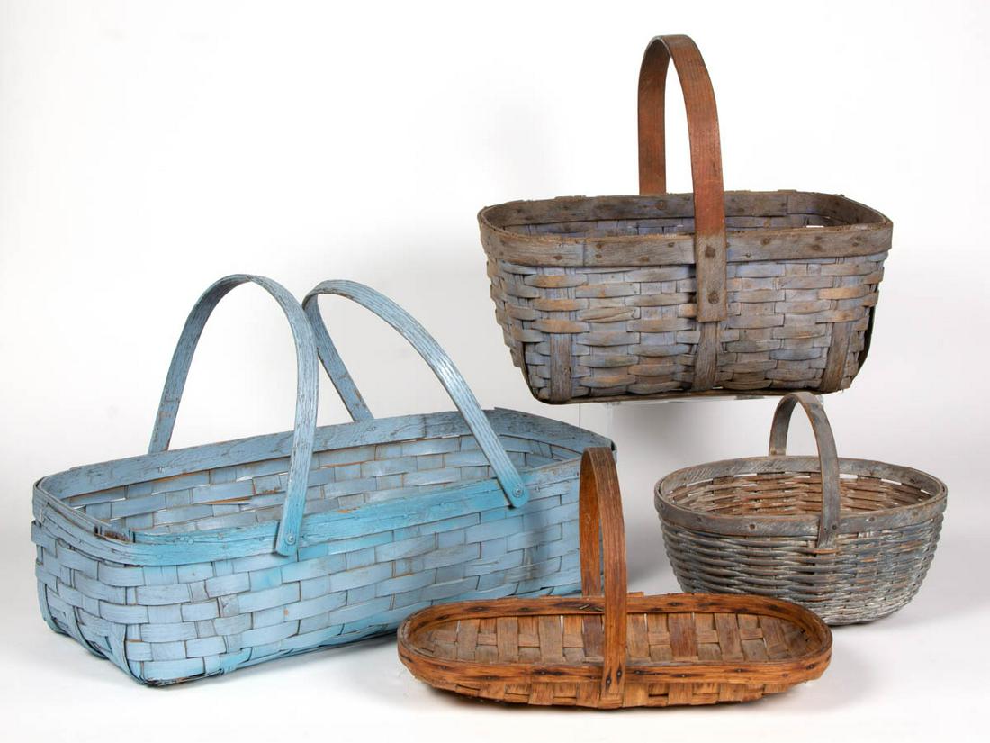 AMERICAN COUNTRY WOVEN-SPLINT GATHERING BASKETS, LOT OF: AMERICAN COUNTRY WOVEN-SPLINT GATHERING BASKETS, LOT OF FOUR, each with arched handle. Three examples retain an old painted surface. First half 20th century. One 9 1/4" HOA, 5 3/4" H rim, 12 1/4" W ri