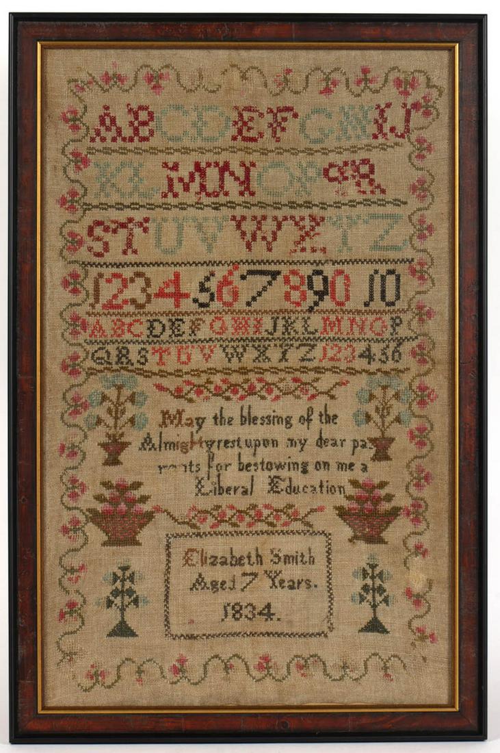 AMERICAN NEEDLEWORK SAMPLER: AMERICAN NEEDLEWORK SAMPLER, wool on linen, six alphabet and numeral rows segmented by horizontal bands of decorative stitching, lower half featuring a four-row verse that reads "May the blessing of t