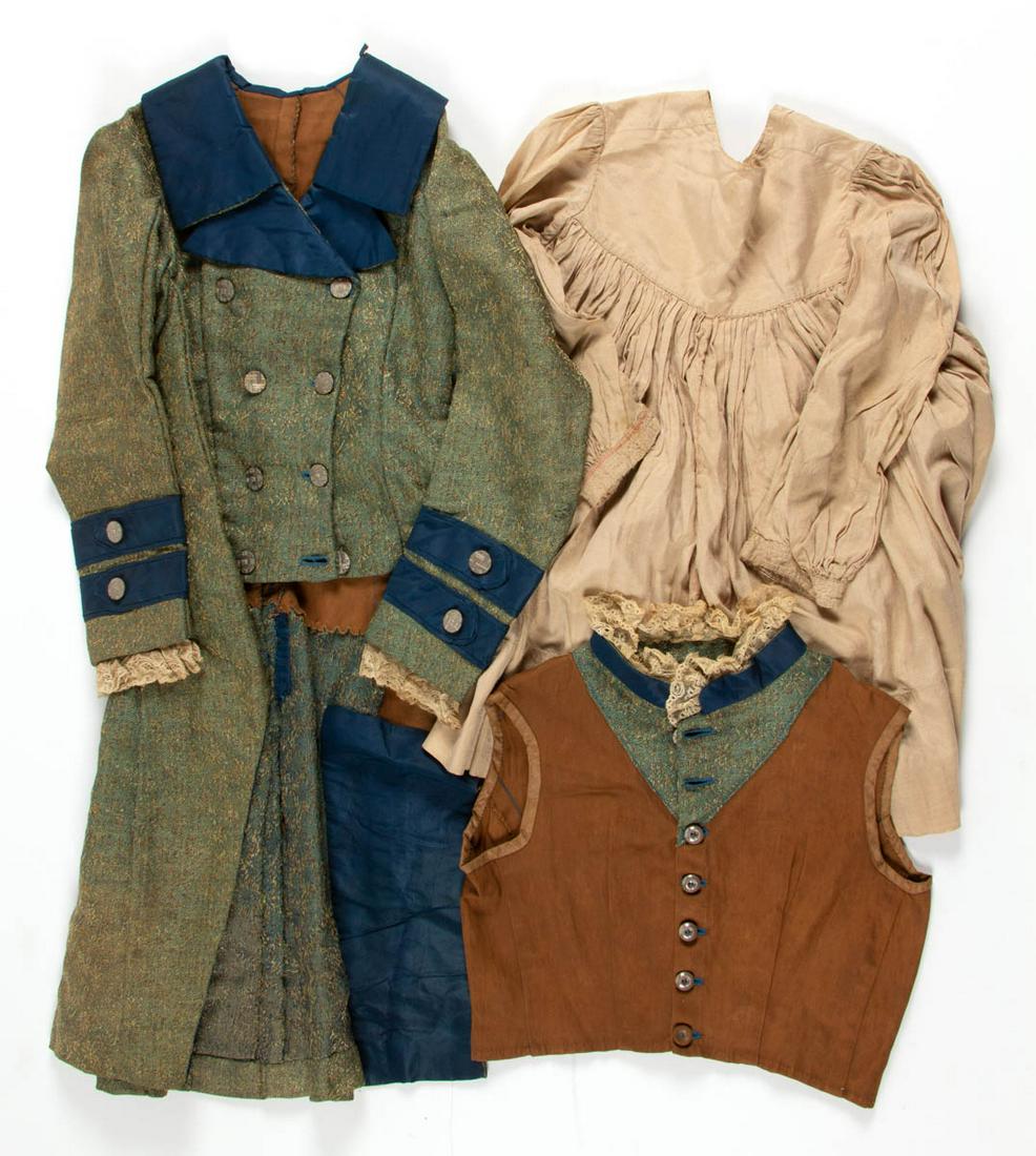 ANTIQUE BOY'S THREE-PIECE OUTFIT: ANTIQUE BOY'S THREE-PIECE OUTFIT, comprising a tail coat and a vest with green, blue, and brown fabric having lace accents and silver-toned buttons by Albert Parent et Lieger (A.P et Cie Paris), and a