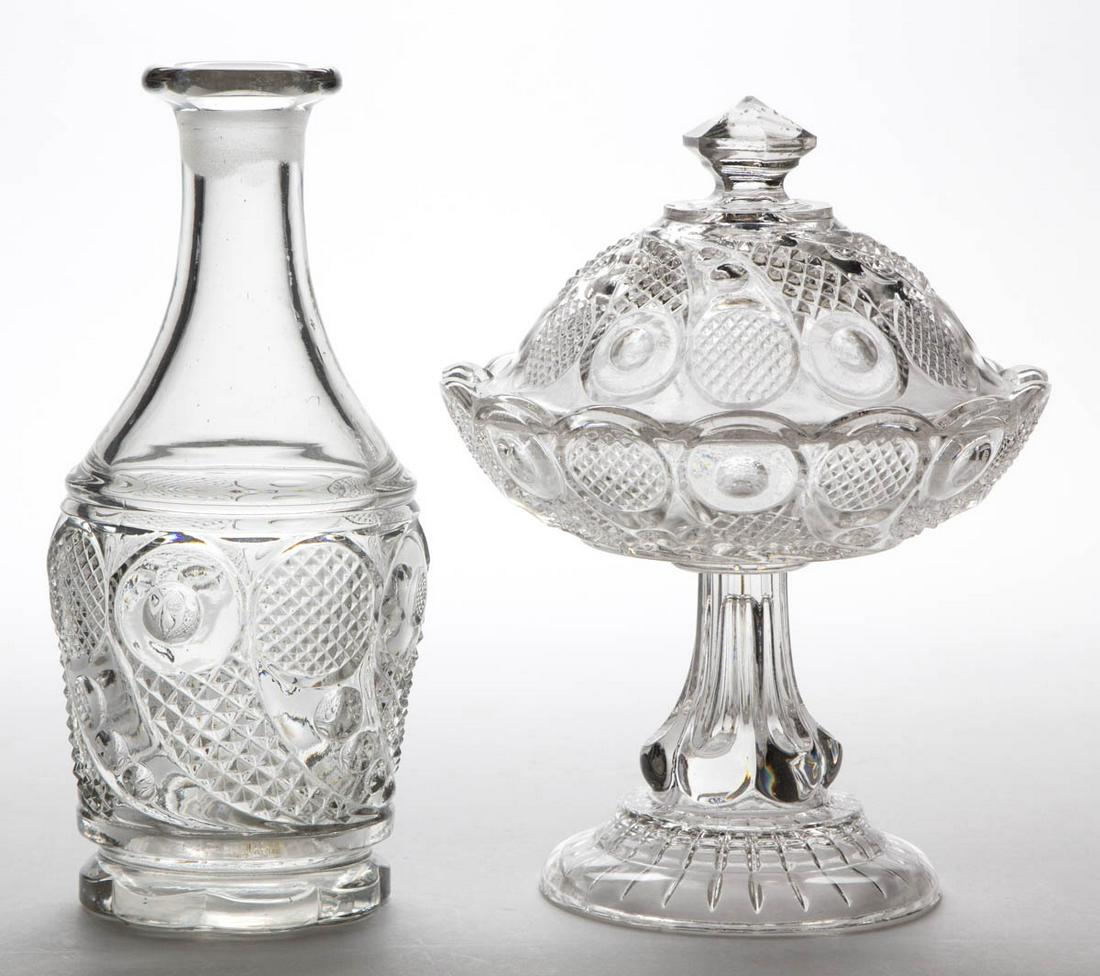 HORN OF PLENTY / COMET (OMN) TABLE ARTICLES, LOT OF TWO: HORN OF PLENTY / COMET (OMN) TABLE ARTICLES, LOT OF TWO, colorless lead glass, comprising a half-pint decanter lacking stopper and a pedestal sweetmeat dish, wafer construction. M'Kee & Bros., Boston
