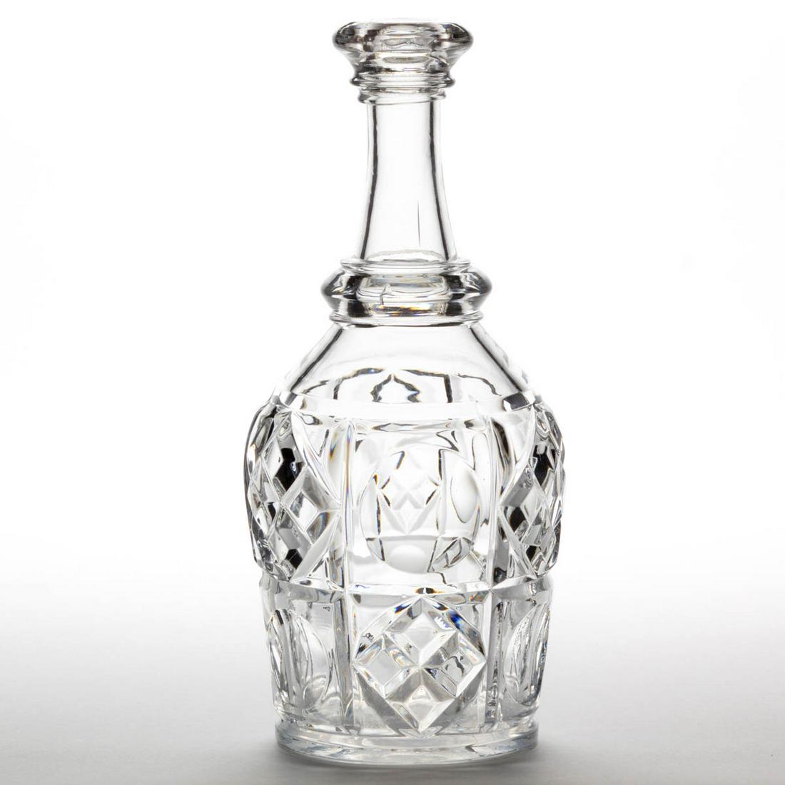 PENNSYLVANIA (OMN) / THUMBPRINT AND DIVIDED DIAMOND BAR: PENNSYLVANIA (OMN) / THUMBPRINT AND DIVIDED DIAMOND BAR DECANTER, colorless lead glass, with polished pontil mark. Bakewell, Pears & Co. Third quarter 19th century. 10 1/2" H. Undamaged with some ligh