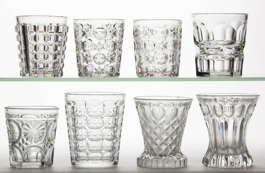 ASSORTED FLINT EAPG WATER TUMBLERS, LOT OF EIGHT: ASSORTED FLINT EAPG WATER TUMBLERS, LOT OF EIGHT, colorless lead glass, including a Brooklyn, two Early Moon and Stars, a Five-Row Argus, and a Waffle. Various makers. Third quarter 19th century. 3 1/