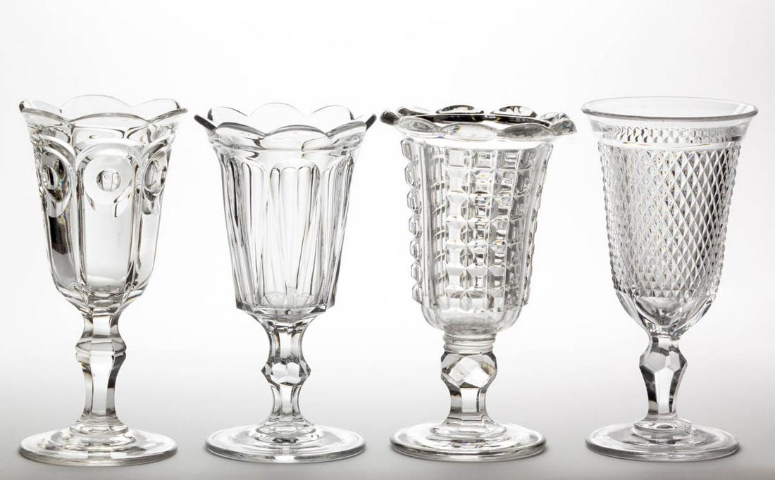 ASSORTED FLINT EAPG CELERY VASES, LOT OF FOUR: ASSORTED FLINT EAPG CELERY VASES, LOT OF FOUR, colorless lead glass, comprising a Diamond Point, a Bull's Eye, Lee, and Panelled Waffle. Various makers. Third quarter 19th century. 9 1/8" to 9 1/4" H.
