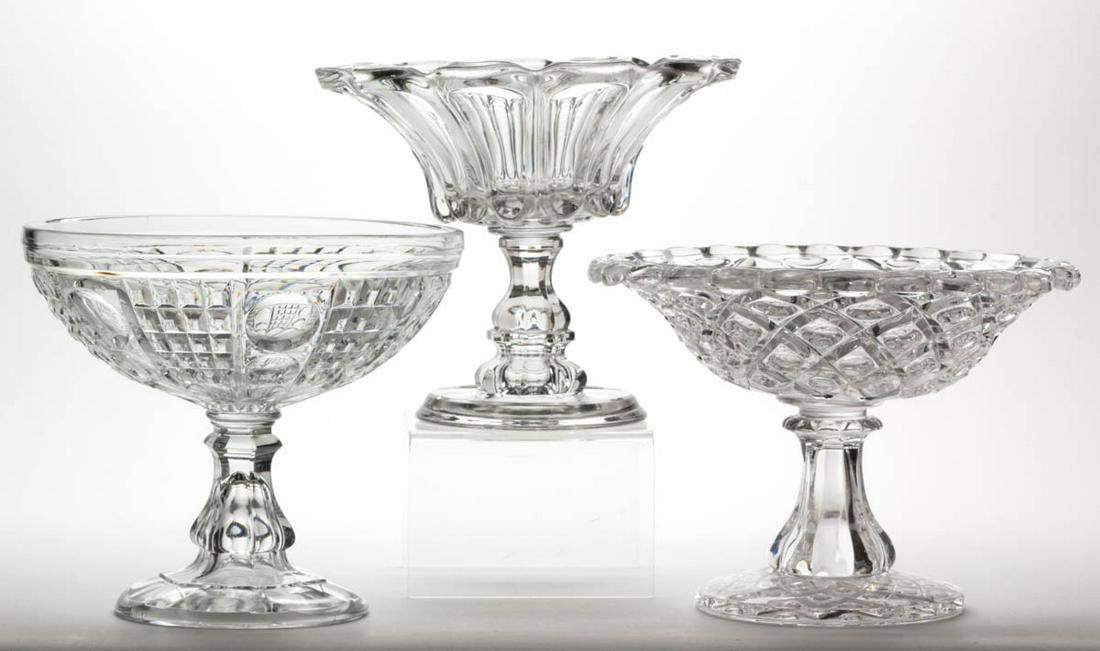 ASSORTED FLINT EAPG OPEN COMPOTES, LOT OF THREE: ASSORTED FLINT EAPG OPEN COMPOTES, LOT OF THREE, colorless lead glass, comprising a Waffle and Thumbprint, a Diamond Thumbprint, and an 11-flute example. Various makers. Third quarter 19th century. 8 