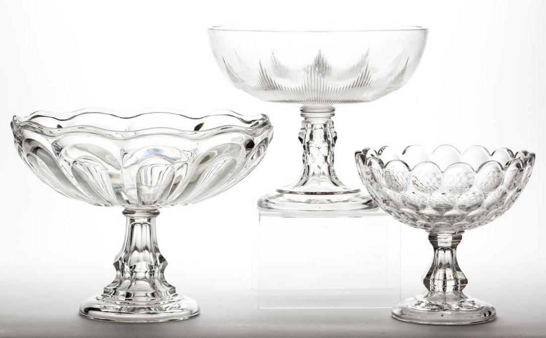 ASSORTED FLINT EAPG OPEN COMPOTES, LOT OF THREE: ASSORTED FLINT EAPG OPEN COMPOTES, LOT OF THREE, colorless lead glass, comprising a Seneca Loop, an Icicle, and a Thumbprint. Various makers. Third quarter 19th century. 6 7/8" to 8 1/4" H, 7 1/2" to 
