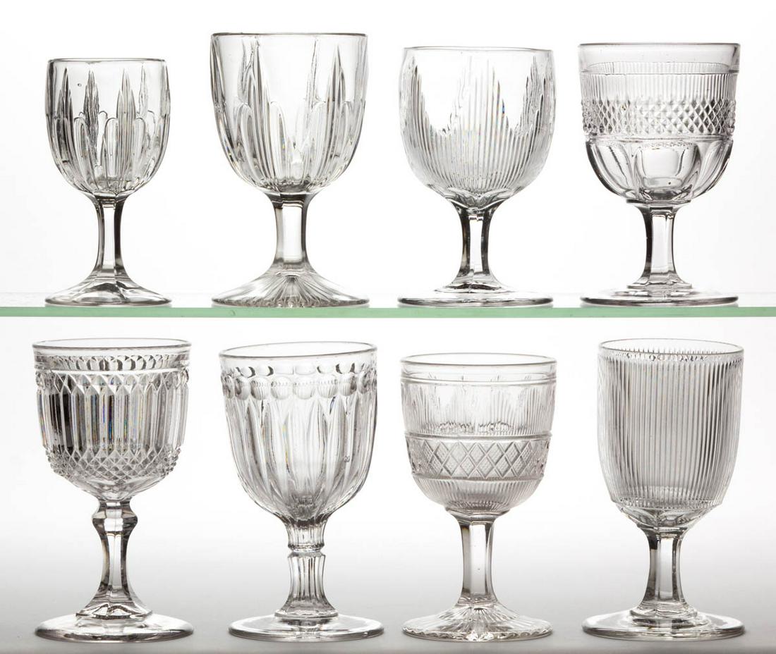 ASSORTED FLINT EAPG DRINKING ARTICLES, LOT OF EIGHT: ASSORTED FLINT EAPG DRINKING ARTICLES, LOT OF EIGHT, colorless lead glass, including a Brooklyn goblet, a Hamilton goblet, and a Stedman goblet and champagne. Various makers. Third quarter 19th centur