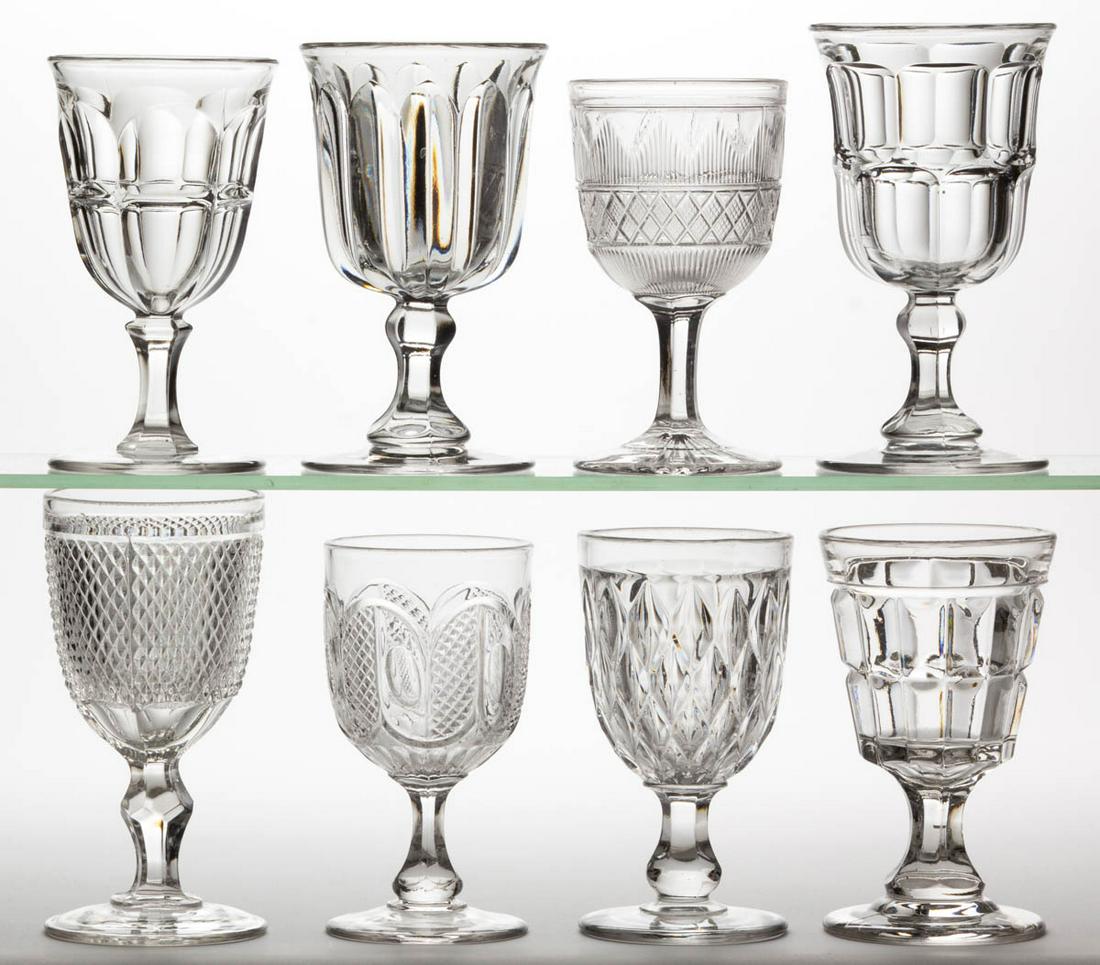ASSORTED FLINT EAPG GOBLETS, LOT OF EIGHT: ASSORTED FLINT EAPG GOBLETS, LOT OF EIGHT, colorless lead glass, including a Hamilton, Diamond Point, Bigler, and Tackle Block. Various makers. Third quarter 19th century. 6" to 6 3/4" H. Undamaged. P