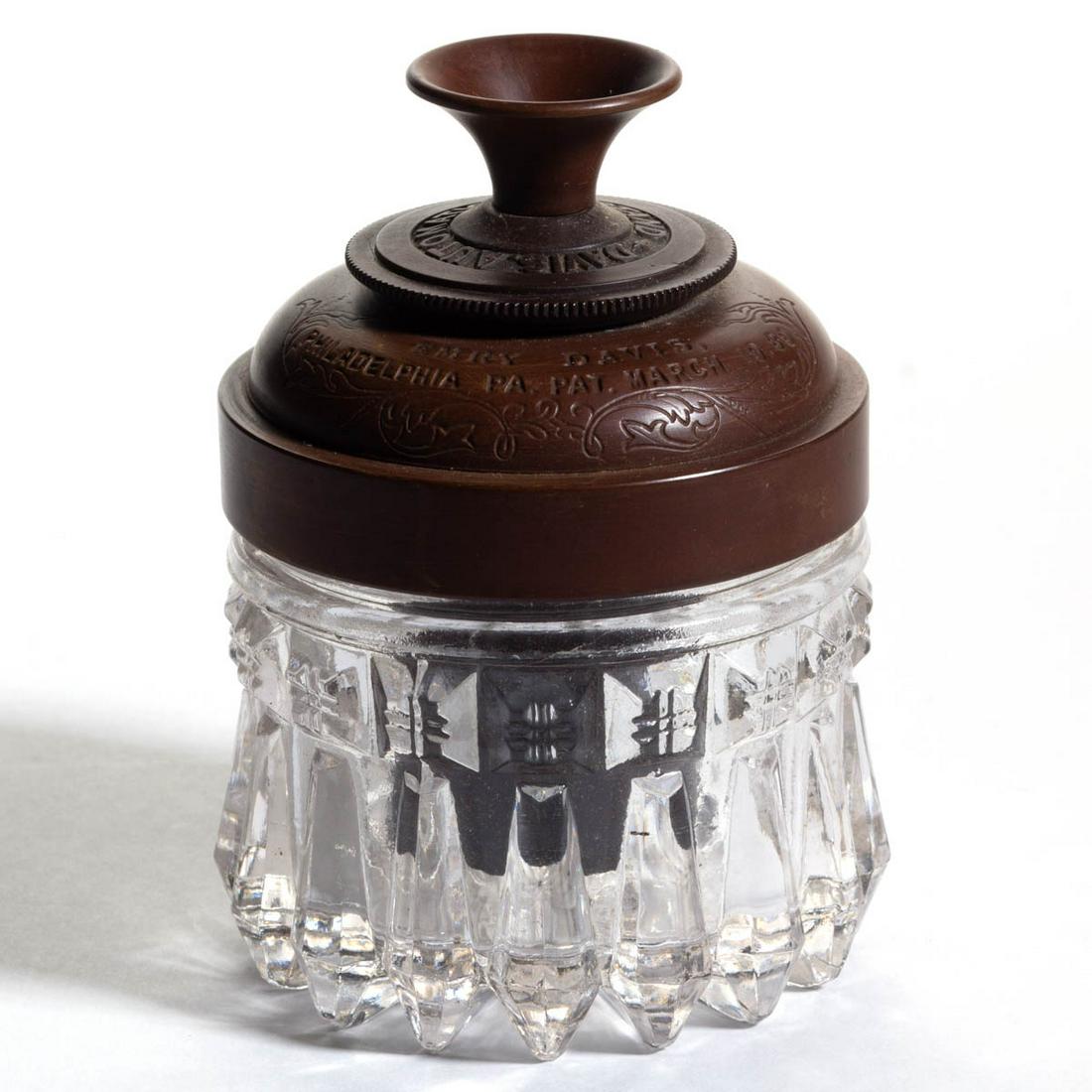 CHANDELIER "EMRY DAVIS" INK STAND: CHANDELIER "EMRY DAVIS" INK STAND, colorless, with complete cover. O'Hara Glass Co. Ltd. Circa 1888. 4 1/4" HOA. Undamaged. Some light mold roughness, as made. Provenance: From the John & late Evelyn 