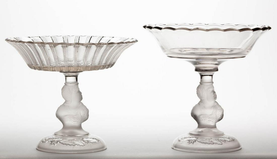 COLUMBIA / JENNY LIND OPEN COMPOTES, LOT OF TWO: COLUMBIA / JENNY LIND OPEN COMPOTES, LOT OF TWO, colorless and frosted, including one with a patterned bowl. Challinor, Taylor & Co. Fourth quarter 19th century. 7 5/8" and 8 1/4" H, 8 1/2" and 8 3/4"