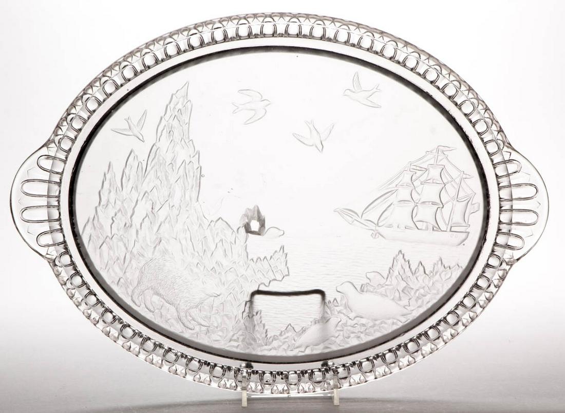 POLAR BEAR WATER TRAY: POLAR BEAR WATER TRAY, colorless and frosted, with tab-handles. Crystal Glass Co. Circa 1883. 11" x 15 1/2". Excellent condition overall having a few scattered flakes to the table ring. Provenance: Fr