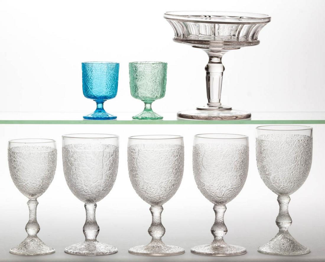 TREE OF LIFE ARTICLES, LOT OF EIGHT: TREE OF LIFE ARTICLES, LOT OF EIGHT, colorless, Sapphire/blue, and Marine Green, comprising two toothpick holders, five goblets, and an open compote with panelled floral and Tree of Life open compote.