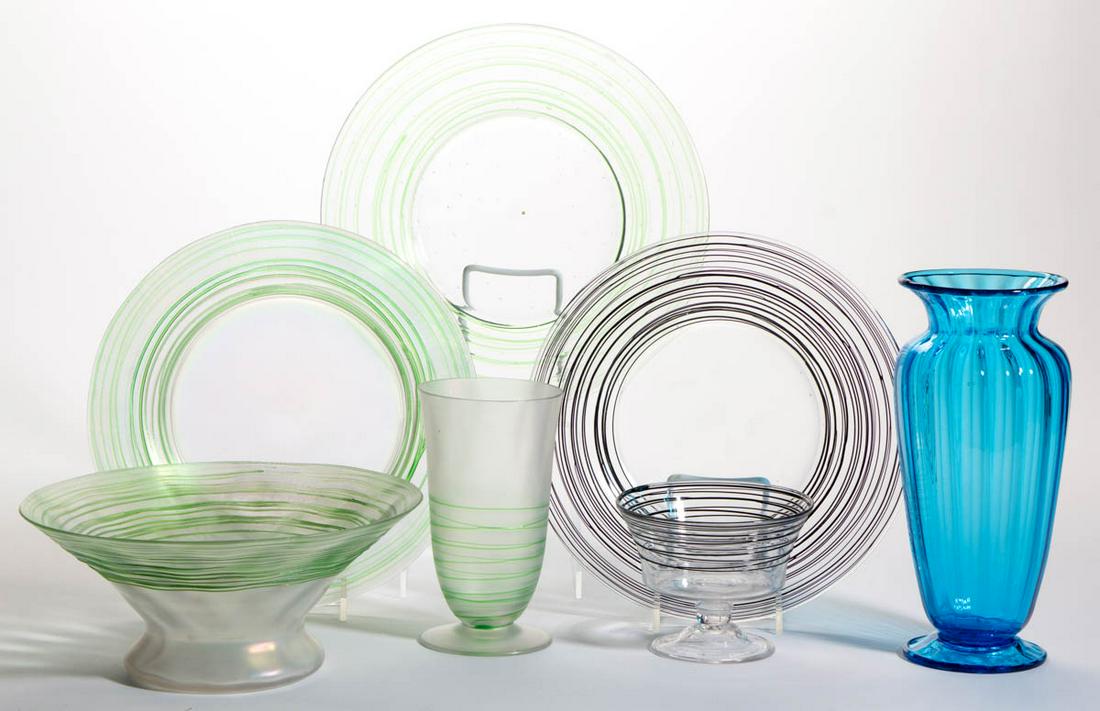STEUBEN ART GLASS ARTICLES, LOT OF SEVEN: STEUBEN ART GLASS ARTICLES, LOT OF SEVEN, comprising two plates, a sweet pea vase, and a footed tumbler with Pomona Green threading, and a plate and sherbet having Mirror Black threading, and a Celest