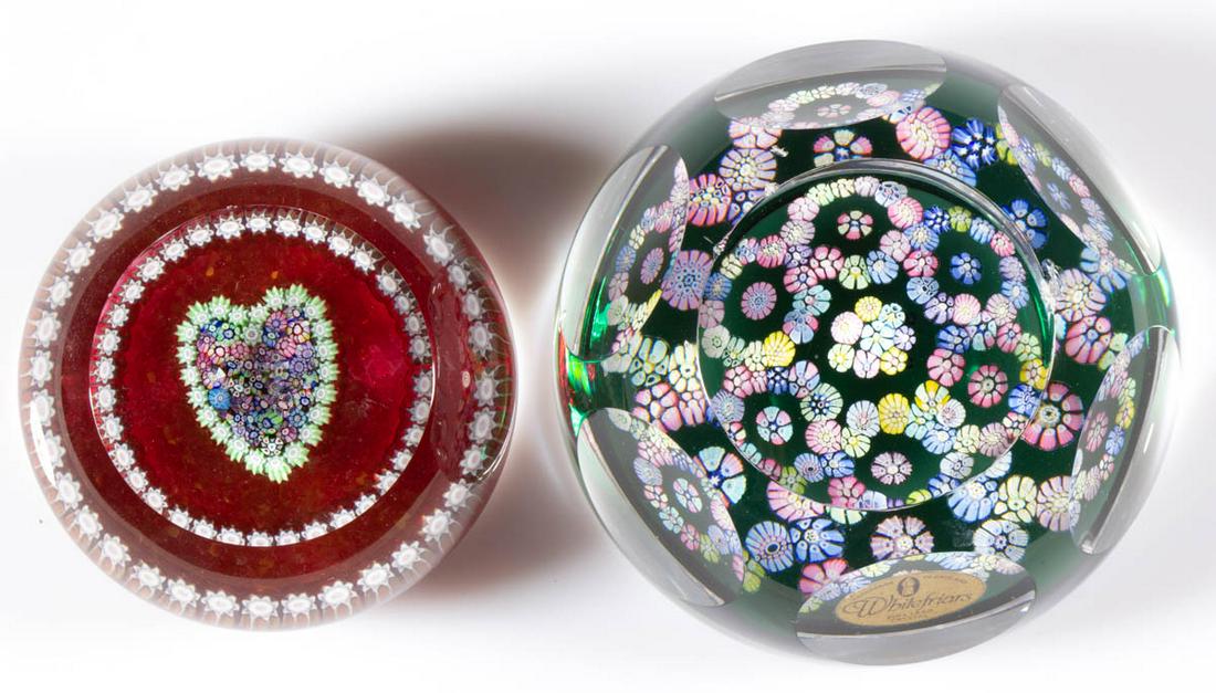 ASSORTED ENGLISH MILLEFIORI GLASS PAPERWEIGHTS, LOT OF: ASSORTED ENGLISH MILLEFIORI GLASS PAPERWEIGHTS, LOT OF TWO, colorless, comprising a Whitefriars cut-faceted millefiori garland, and a Perthshire Heart millefiori with a crackled cranberry ground. Vari
