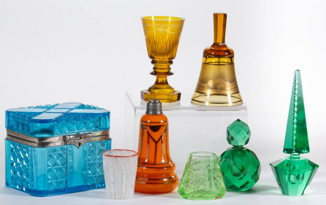 ASSORTED GLASS ARTICLES, LOT OF EIGHT: ASSORTED GLASS ARTICLES, LOT OF EIGHT, various colors, including a pressed glass dresser box, two green cut-faceted perfume bottles, and an orange Czech perfume bottle base. Various makers. Late 19th 