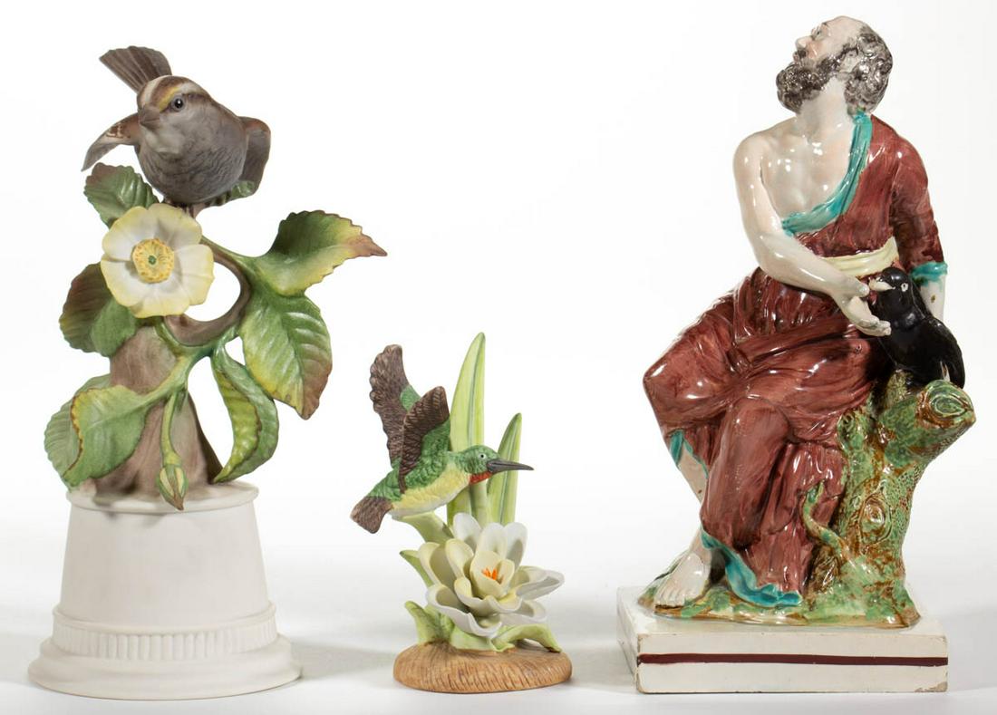ASSORTED CERAMIC BIRD-MOTIF FIGURES, LOT OF THREE: ASSORTED CERAMIC BIRD-MOTIF FIGURES, LOT OF THREE, comprising a pearlware Staffordshire example featuring Elijah sitting on a stump with a raven holding bread on left side, a "White-throated Sparrow",