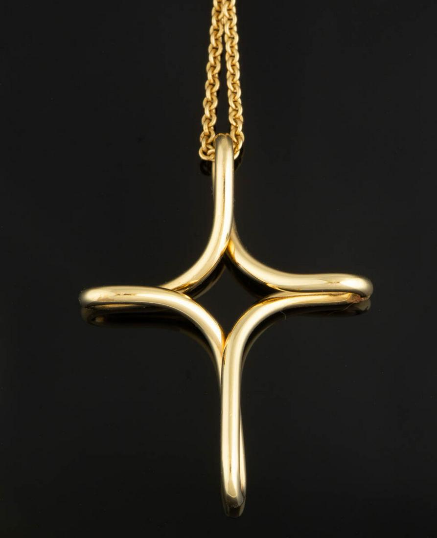 ELSA PERETTI FOR TIFFANY & CO. 18K YELLOW GOLD: ELSA PERETTI FOR TIFFANY & CO. 18K YELLOW GOLD "INFINITY CROSS" PENDANT ON NECKLACE CHAIN, pendant made from a single bent wire into a cross, on a cable chain with spring ring clasp. Pendant marked "T
