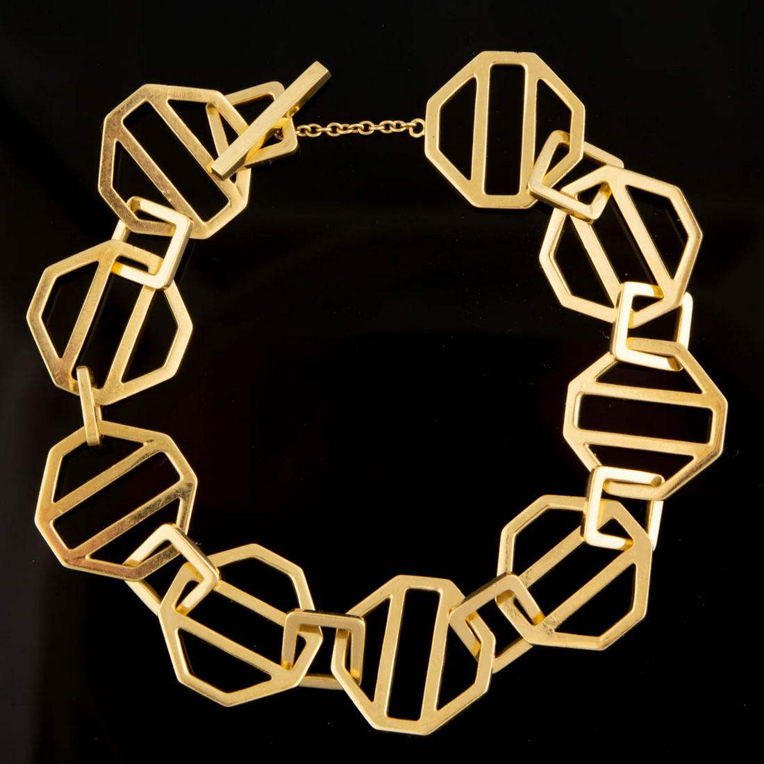 PALOMA PICASSO FOR TIFFANY & CO. 18K YELLOW GOLD: PALOMA PICASSO FOR TIFFANY & CO. 18K YELLOW GOLD "ZELLIGE" BRACELET, having nine large octagonal links alternating with square connector links, toggle clasp. Marked "PALOMA PICASSO / T & CO. / 750". T