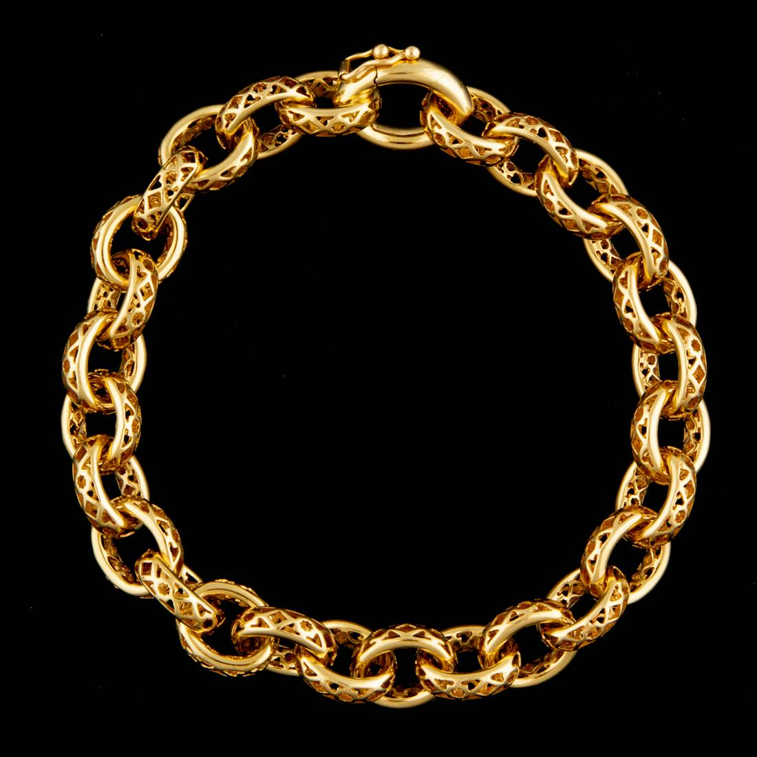 PALOMA PICASSO FOR TIFFANY & CO. 18K YELLOW GOLD: PALOMA PICASSO FOR TIFFANY & CO. 18K YELLOW GOLD "MARRAKESH" LINK BRACELET, cable chain style with openwork links, hinged clasp with safety lock. Marked "(c) PALOMA PICASSO / TIFFANY & CO. AU 750 ITAL