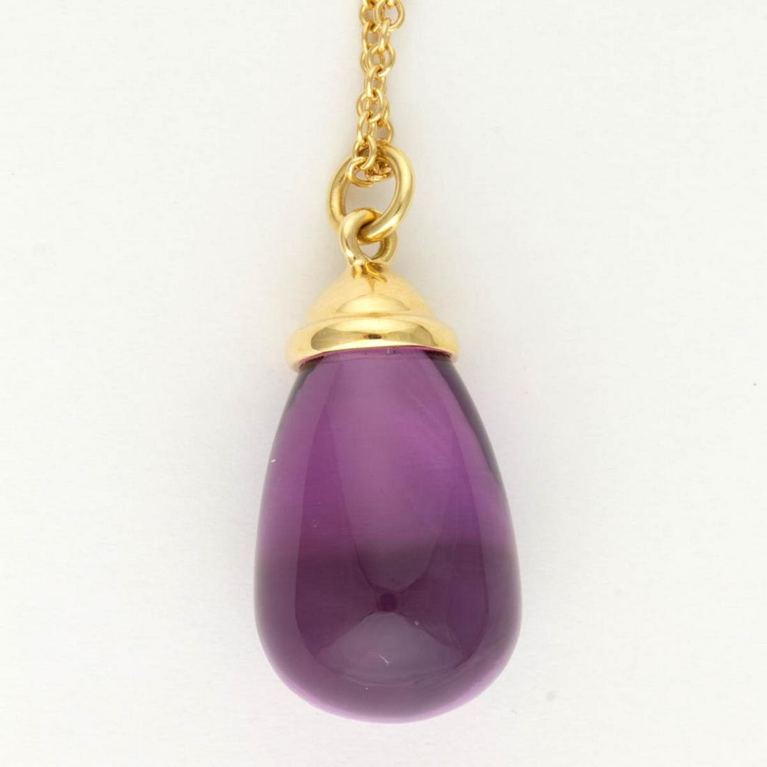 PALOMA PICASSO FOR TIFFANY & CO. 18K YELLOW GOLD AND: PALOMA PICASSO FOR TIFFANY & CO. 18K YELLOW GOLD AND AMETHYST NECKLACE, tear-drop amethyst pendant with gold mounting on a cable necklace chain with spring ring clasp, including a Tiffany & Co. blue c