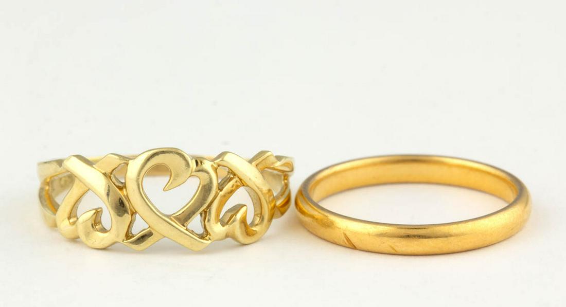 PALOMA PICASSO FOR TIFFANY & CO. 18K YELLOW GOLD: PALOMA PICASSO FOR TIFFANY & CO. 18K YELLOW GOLD "LOVING HEART" RING, having three connected hearts. Interior band marked "(c) Paloma Picasso" and "TIFFANY & CO. 750". Total weight: 2.7 dwt. Together 