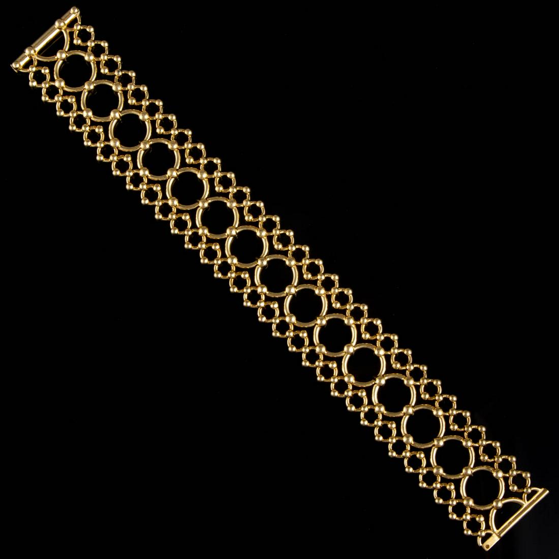 VINTAGE TIFFANY & CO. 18K YELLOW GOLD BRACELET: VINTAGE TIFFANY & CO. 18K YELLOW GOLD BRACELET, having three rows of beaded round chain links, sliding bar clasp with safety lock. Marked "TIFFANY & CO. 750". Total weight: 30.6 dwt. 20th century. 7 1