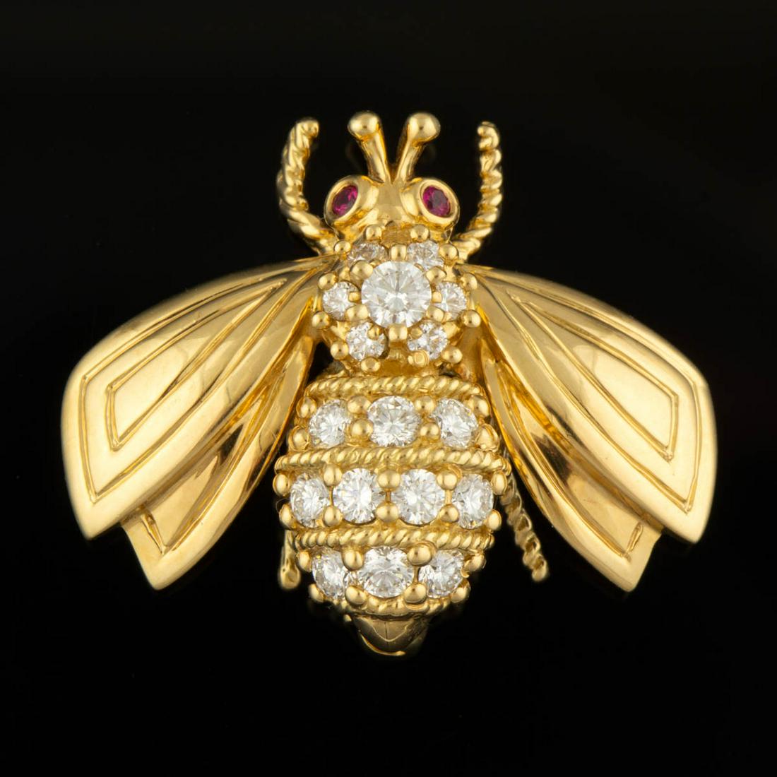 VINTAGE TIFFANY & CO. 18K YELLOW GOLD, DIAMOND, AND: VINTAGE TIFFANY & CO. 18K YELLOW GOLD, DIAMOND, AND RUBY FIGURAL BEE PIN / BROOCH, having two round-cut rubies for eyes, thorax with a center 2.7 mm round brilliant cut diamond having an estimated wei