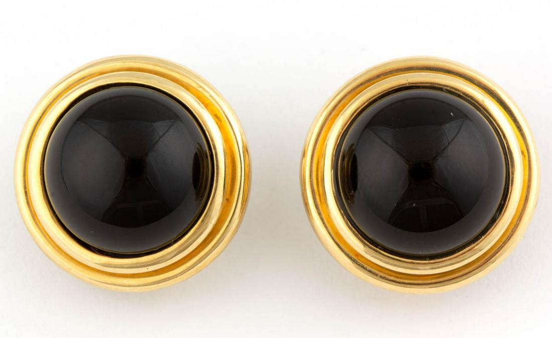 VINTAGE TIFFANY & CO. 18K YELLOW GOLD AND ONYX: VINTAGE TIFFANY & CO. 18K YELLOW GOLD AND ONYX EARRINGS, PAIR, each round form with round onyx cabochon center, post back with omega clip fastener, including a Tiffany & Co. blue cloth pouch and box. 