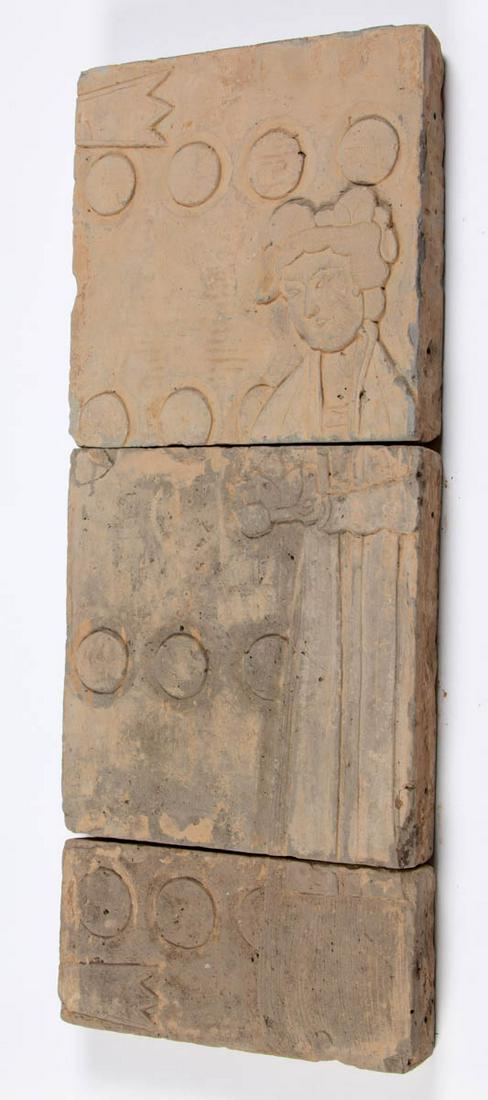 CHINESE EARTHENWARE THREE-PIECE TOMB TILE PANEL: CHINESE EARTHENWARE THREE-PIECE TOMB TILE PANEL, three sections depicting a woman attendant with incised circular motifs in the background, remnants of sand-colored pigment. An undated descriptive she