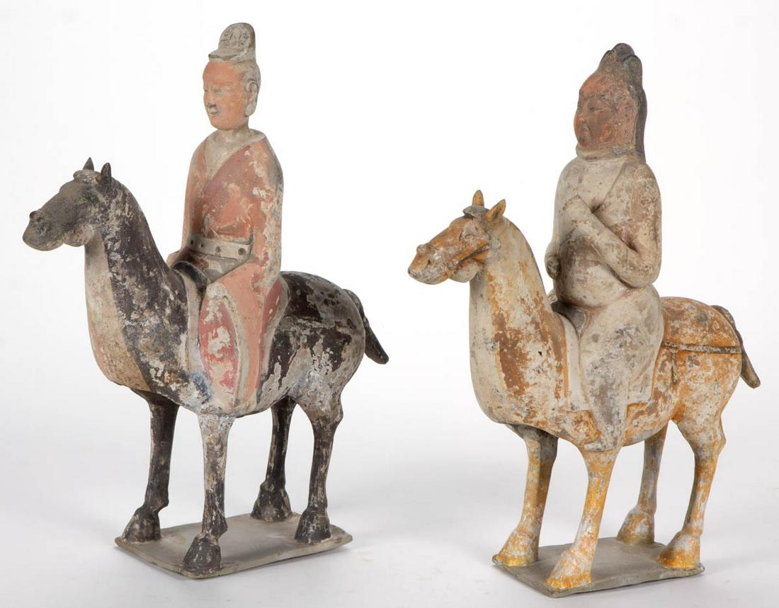 CHINESE EARTHENWARE HORSE AND RIDER TOMB FIGURES, LOT: CHINESE EARTHENWARE HORSE AND RIDER TOMB FIGURES, LOT OF TWO, featuring pigment remnants, horses attached to rectangular bases. Two descriptive sheets from Arch Angel Antiques, Hong Kong, with one dat