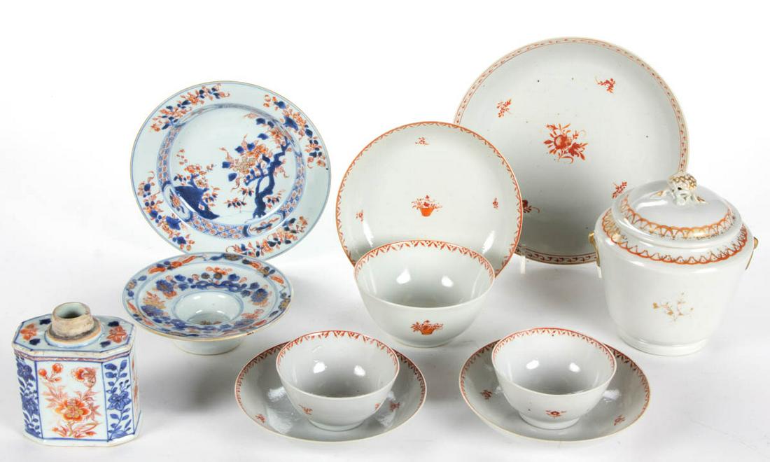 CHINESE EXPORT HAND-PAINTED PORCELAIN TABLE AND TEA: CHINESE EXPORT HAND-PAINTED PORCELAIN TABLE AND TEA ARTICLES, LOT OF 11, including three matching cup and saucer sets featuring red and gilt floral basket design with spaced sprig decorations; a shall