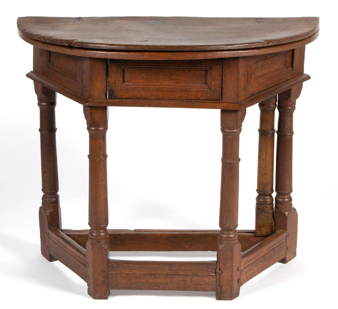 ENGLISH JACOBEAN OAK GATE-LEG TABLE: ENGLISH JACOBEAN OAK GATE-LEG TABLE, of diminutive form, featuring hinged top, single drawer, and turned legs joined with heavy molded stretcher. Old surface with warm color. 17th century. 31 1/2" H, 