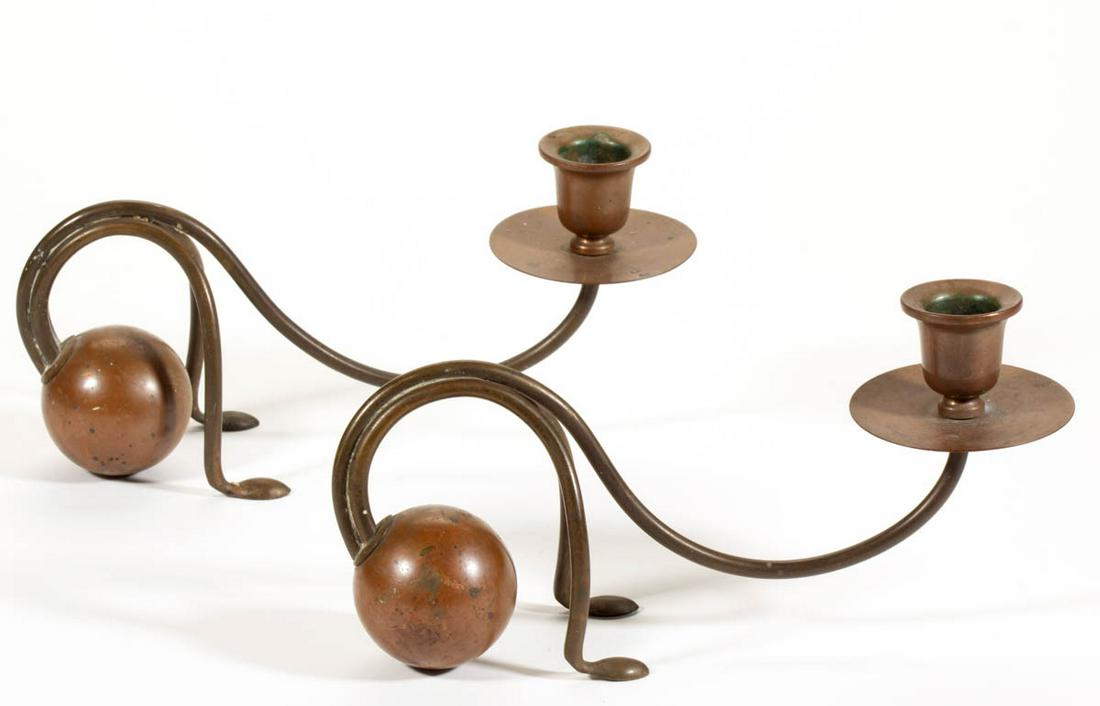 PAIR OF CARL DEFFNER (GERMAN, 1856-1948) ART NOUVEAU: PAIR OF CARL DEFFNER (GERMAN, 1856-1948) ART NOUVEAU COPPER AND BRASS CANDLESTICKS, "CDE" mark in cartouche. Retains a rich, undisturbed patina. Circa 1900. Each 4 1/2" HOA, 9 1/2" LOA.Excellent overa