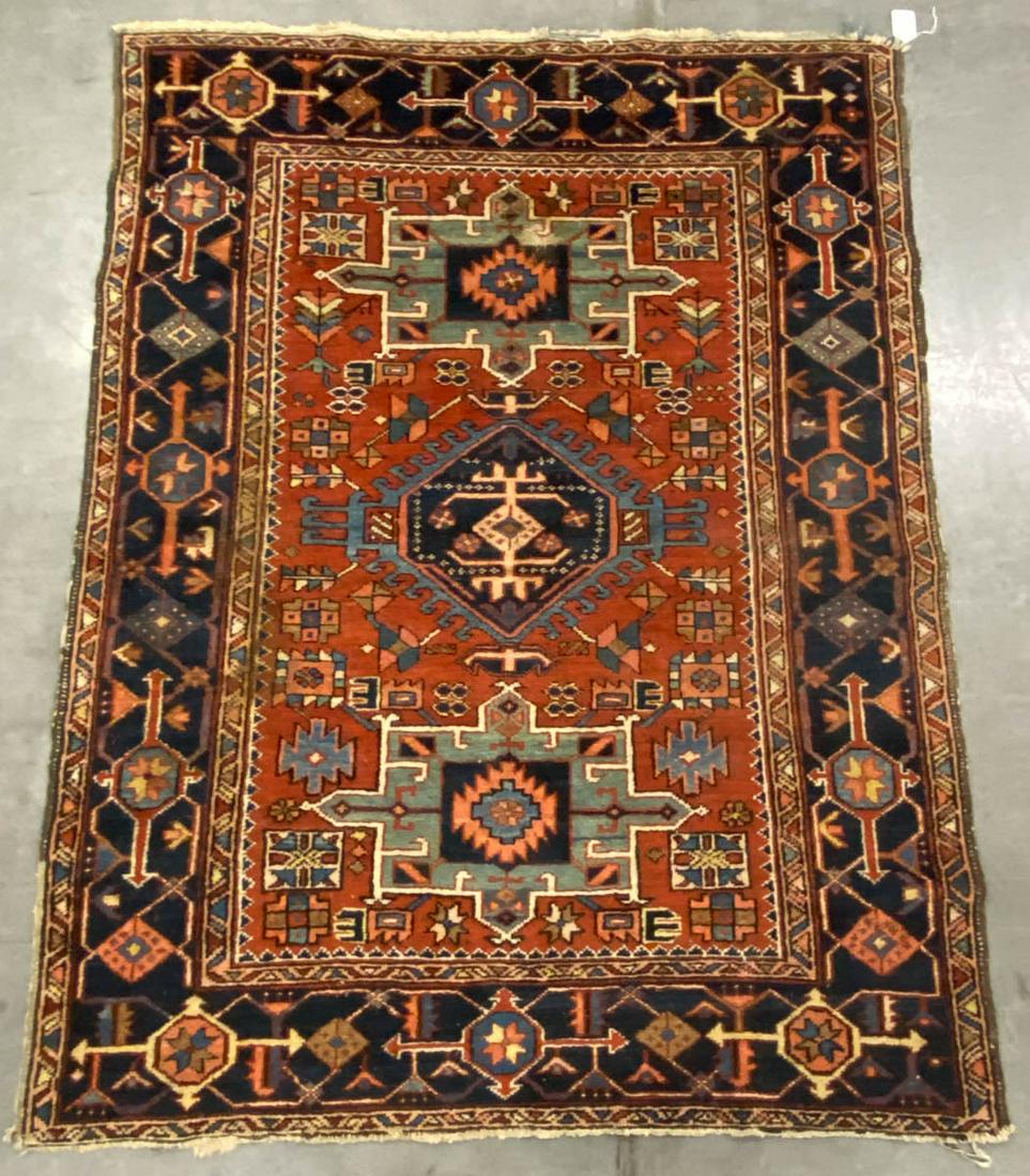 ANTIQUE PERSIAN SCATTER RUG: ANTIQUE PERSIAN SCATTER RUG, bold color, red, green and blue ground, with three central medallions. Late 19th/early 20th century. 6' 5" x 4' 11".Very good overall condition, minor losses to edges and