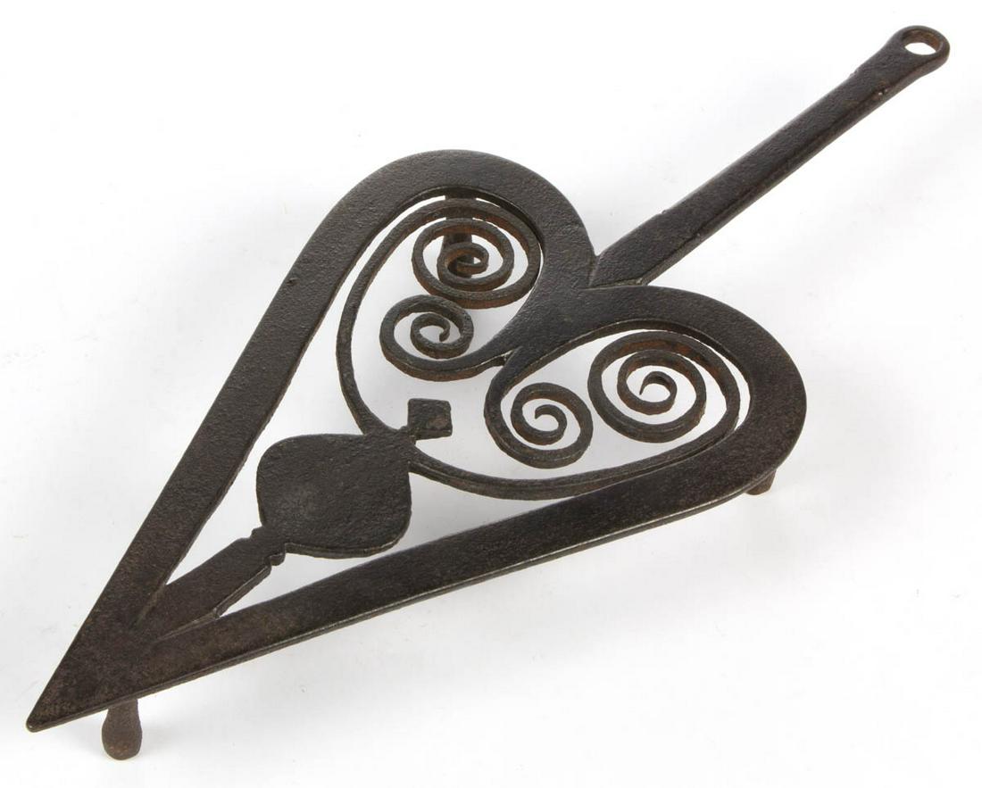 WROUGHT-IRON FIGURAL HEARTH TRIVET (1 of 2)