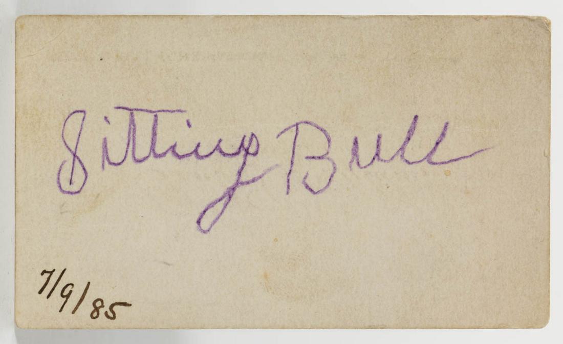 RARE SIGNED SITTING BULL BUSINESS CARD: RARE SIGNED SITTING BULL BUSINESS CARD, signed in purple pencil on the back of the printed business card of "Paul C. Blum / WITH / SITTING BULL COMBINATION", possibly later 7/9/85" notation in bottom 