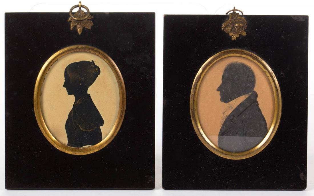 BRITISH SCHOOL (19TH CENTURY) CUT-AND-PASTED: BRITISH SCHOOL (19TH CENTURY) CUT-AND-PASTED SILHOUETTES, LOT OF TWO, a young woman and an older gentleman, each bust-length and housed in an ebonized frame with cast-brass hanger, she with gilt highl