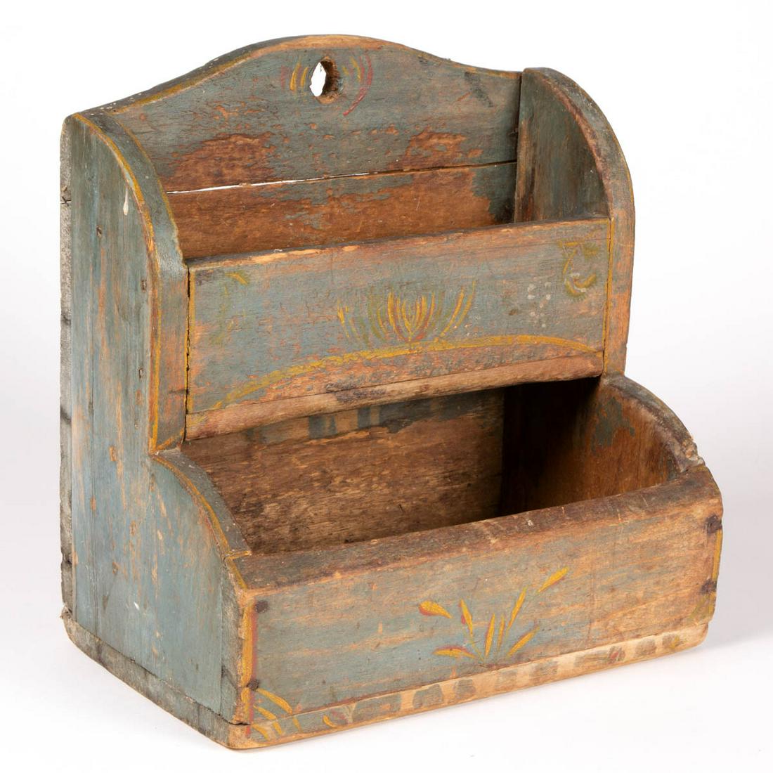 AMERICAN PAINT-DECORATED POPLAR WALLBOX: AMERICAN PAINT-DECORATED POPLAR WALLBOX, two-tier form with shaped back and sides. Retaining likely original polychrome surface featuring red and yellow floral / foliate devices on a robin's-egg blue 