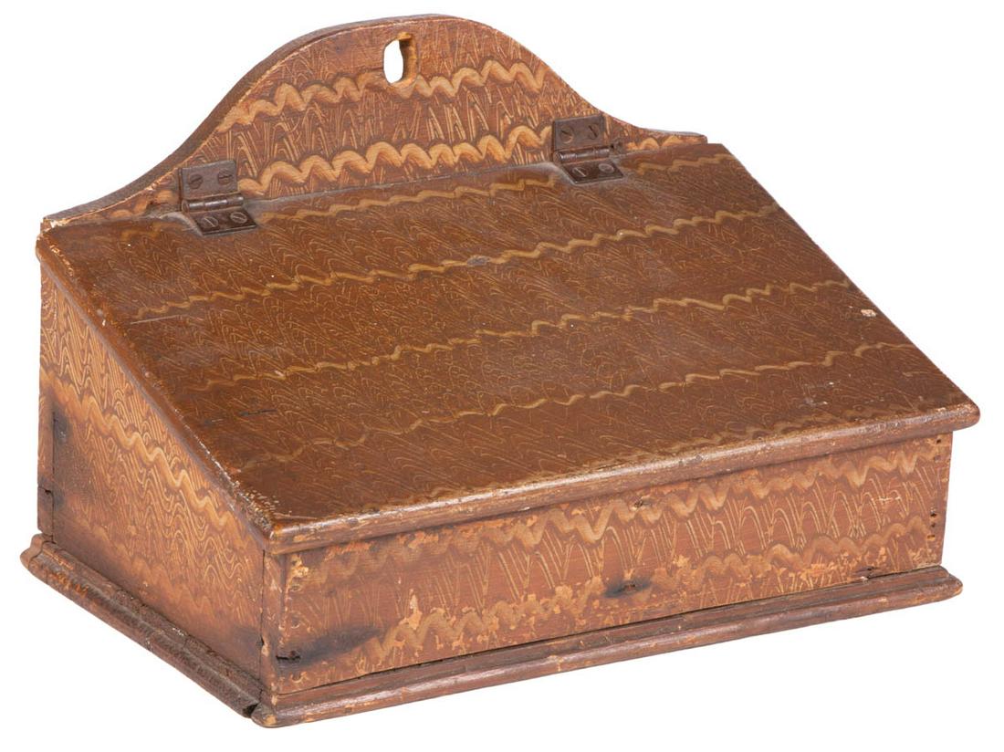 PENNSYLVANIA PAINT-DECORATED SLANT-LID WALL BOX: PENNSYLVANIA PAINT-DECORATED SLANT-LID WALL BOX, pine and poplar, rectangular form with nailed construction, arched back board with hanging hole, lid attached with original iron hinges, molded edge ba