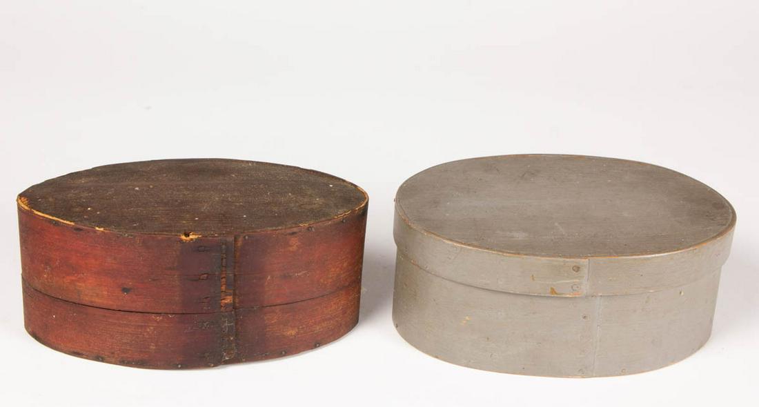 COUNTRY PAINTED BENTWOOD PANTRY BOXES, LOT OF TWO: COUNTRY PAINTED BENTWOOD PANTRY BOXES, LOT OF TWO, each oval covered form of lapped construction, one retaining early gray-painted surface, the other an early red wash. 19th century. Gray example 3 1/
