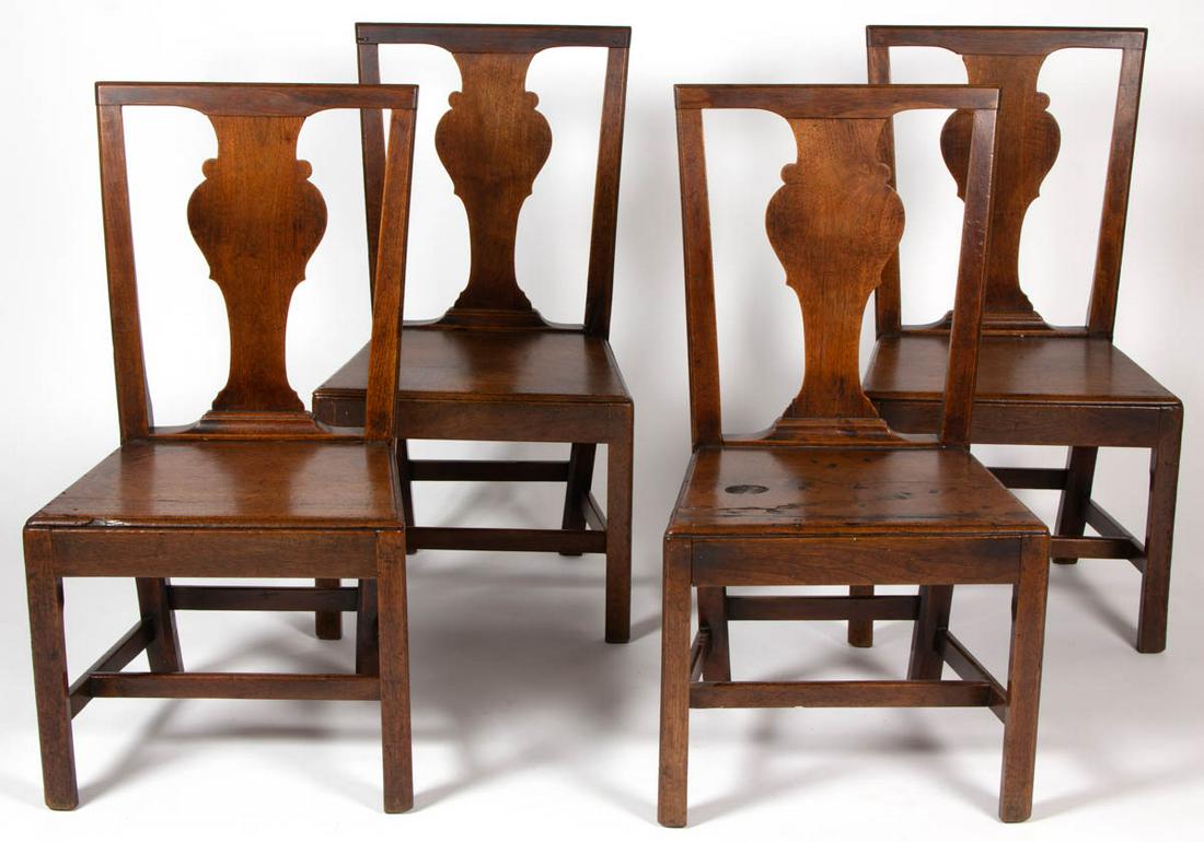 SET OF FOUR AMERICAN OR BRITISH CHIPPENDALE WALNUT SIDE: SET OF FOUR AMERICAN OR BRITISH CHIPPENDALE WALNUT SIDE CHAIRS, each having squared crest rail over a solid vasiform splat set into a separate shoe, flanked by molded stiles, above a trapezoidal seat 